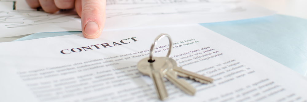 mortgage doc with hands and keys